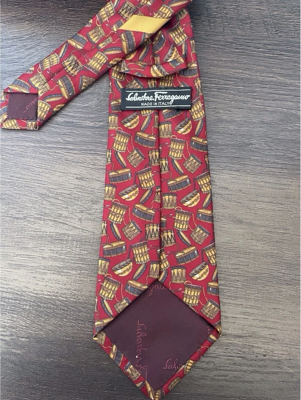 Salvadore Ferraragamo Neck Tie Made in Italy Burgundy Drum Design